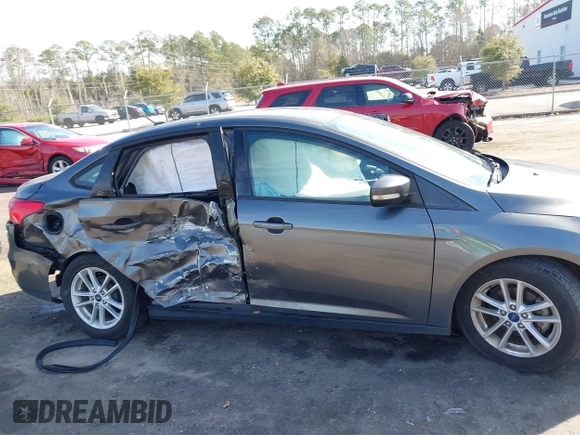2017 Ford Focus SE with VIN 1FADP3F2XHL312253, listed as a IAAI auction lot 41480167 with 86,459 mi miles. Bid and sale history available at carsss.com. Image 13.