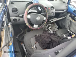 2004 Volkswagen New Beetle Coupe GLS with VIN 3VWCK31C04M409620, listed as a Copart auction lot 45214295 with 131,602 mi miles and Salvage Title. Bid and sale history available at carsss.com. Image 8.