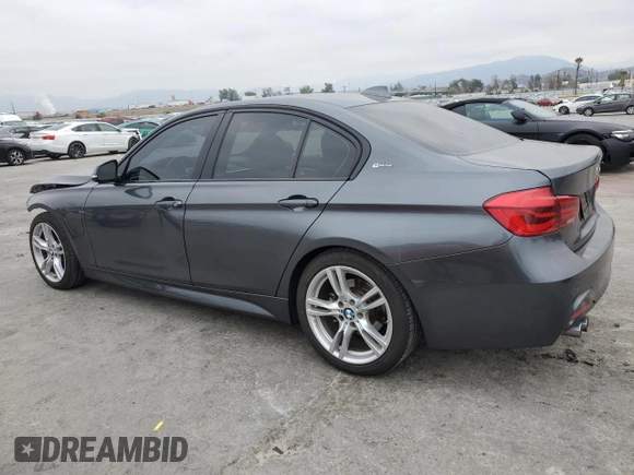 2018 BMW 3 Series 330e iPerformance with VIN WBA8E1C52JA758674, listed as a Copart auction lot 43273165 with 77,325 mi miles and Salvage Title. Bid and sale history available at carsss.com. Image 2.