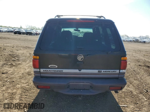 1997 Mercury Mountaineer with VIN 4M2DU55P5VUJ62435, listed as a Copart auction lot 60163465 with 105,646 mi miles and Salvage title. Bid and sale history available at DreamBid. Image 6.