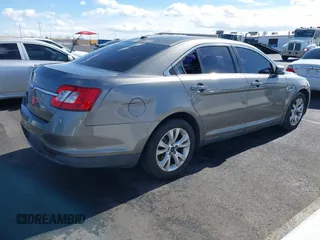 2011 Ford Taurus SEL with VIN 1FAHP2EW9BG158991, listed as a IAAI auction lot 41530132 with 153,323 mi miles. Bid and sale history available at carsss.com. Image 4.