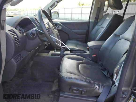 2016 Nissan Frontier Pro-4X with VIN 1N6AD0EVXGN702673, listed as a Copart auction lot 54716865 with 81,258 mi miles and Salvage title. Bid and sale history available at DreamBid. Image 7.