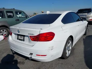 2014 BMW 4 Series 428i xDrive with VIN WBA3N5C56EF716566, listed as a IAAI auction lot 41245322 with 72,252 mi miles and . Bid and sale history available at DreamBid. Image 4.