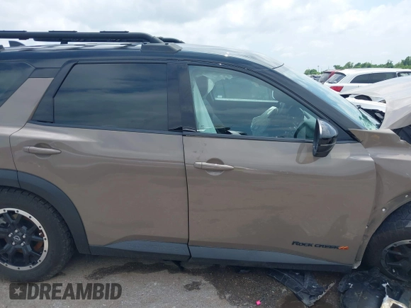 2023 Nissan Pathfinder Rock Creek with VIN 5N1DR3BD9PC228981, listed as a IAAI auction lot 42074519 with 34,763 mi miles and . Bid and sale history available at DreamBid. Image 12.