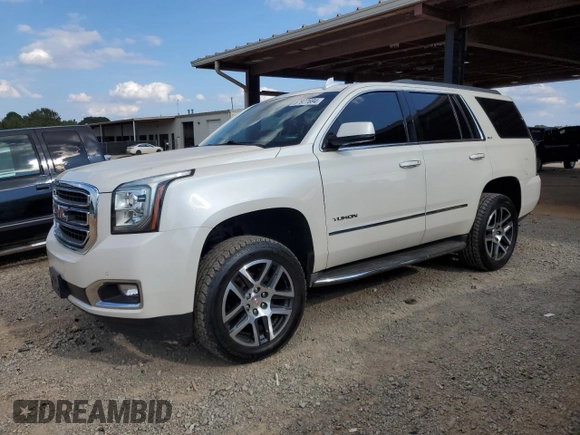 2015 GMC Yukon SLT with VIN 1GKS2BKC1FR736203, listed as a Copart auction lot 67977694 with 178,781 mi miles and Salvage Title. Bid and sale history available at carsss.com. Image 1.
