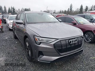 2021 Audi e-tron Premium with VIN WA1AAAGE8MB010823, listed as a IAAI auction lot 41254590 with 21,171 mi miles. Bid and sale history available at carsss.com. Image 1.