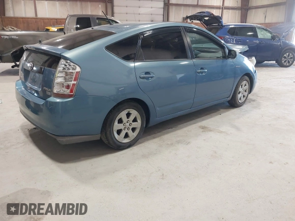2007 Toyota Prius with VIN JTDKB20U377692354, listed as a IAAI auction lot 42055104 with 299,000 mi miles. Bid and sale history available at carsss.com. Image 4.