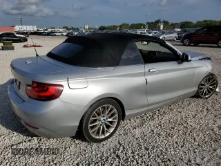 2016 BMW 2 Series 228i with VIN WBA1K9C57GV321957, listed as a Copart auction lot 59200583 with 65,761 mi miles. Bid and sale history available at carsss.com. Image 3.