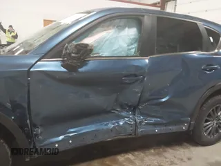 2019 Mazda CX-5 Touring with VIN JM3KFBCM1K0584369, listed as a IAAI auction lot 41657765 with 77,934 mi miles. Bid and sale history available at carsss.com. Image 6.