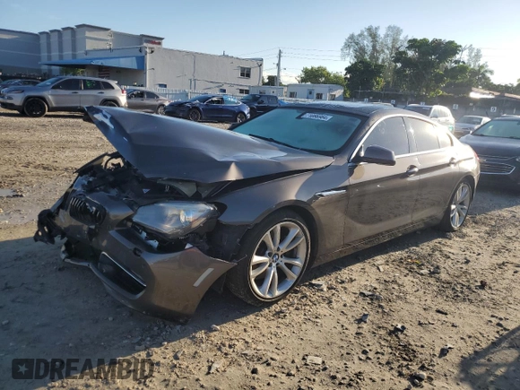 2014 BMW 6 Series 640i z VIN WBA6A0C58EDZ04545, wystawiony jako Copart lot #71086984 z przebiegiem 99 048 mil mil oraz Szkoda całkowita • Salvage title. Historia ofert i sprzedaży dostępna na DreamBid. Obrazek 1.