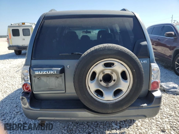 2005 Suzuki XL7 LX z VIN JS3TY92V654107848, wystawiony jako Copart lot #73425794 z przebiegiem Nie podano mil oraz Szkoda całkowita • Salvage title. Historia ofert i sprzedaży dostępna na DreamBid. Obrazek 6.