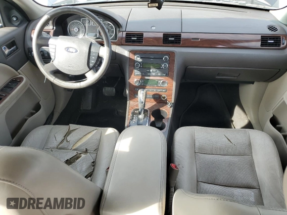 2008 Ford Taurus SEL with VIN 1FAHP24W48G162649, listed as a Copart auction lot 77713744 with 145,707 mi miles and Salvage Title. Bid and sale history available at carsss.com. Image 8.