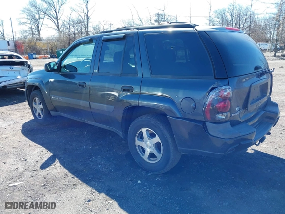 2004 Chevrolet TrailBlazer LS with VIN 1GNDT13S142391821, listed as a IAAI auction lot 41860650 with 184,915 mi miles. Bid and sale history available at carsss.com. Image 3.