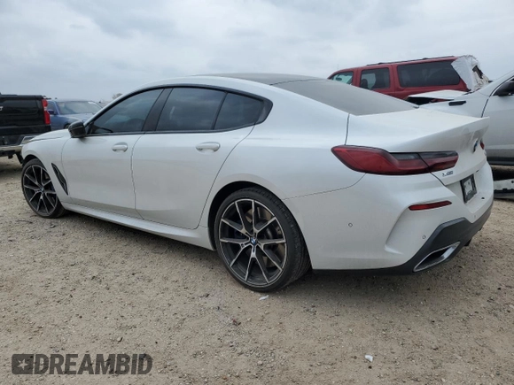 2023 BMW 8 Series M850i z VIN WBAGV8C01PCK29190, wystawiony jako Copart lot #47189205 z przebiegiem 32 691 mil mil oraz Szkoda całkowita • Salvage title. Historia ofert i sprzedaży dostępna na DreamBid. Obrazek 2.
