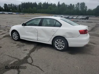 2012 Volkswagen Jetta SE with VIN 3VWDP7AJ5CM301293, listed as a Copart auction lot 57131005 with 93,898 mi miles and Salvage title. Bid and sale history available at DreamBid. Image 2.