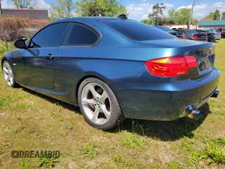 2012 BMW 3 Series 335i with VIN WBAKG7C51CE802713, listed as a IAAI auction lot 42032267 with 124,349 mi miles. Bid and sale history available at carsss.com. Image 3.