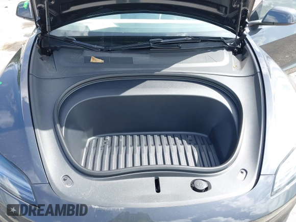 2025 Tesla Model 3 Long Range with VIN 5YJ3E1EA7SF940208, listed as a IAAI auction lot 42433793 with 1,983 mi miles and . Bid and sale history available at DreamBid. Image 10.