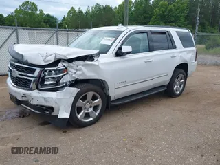 2020 Chevrolet Tahoe LT with VIN 1GNSCBKC4LR181887, listed as a IAAI auction lot 42160821 with 106,757 mi miles and . Bid and sale history available at DreamBid. Image 20.