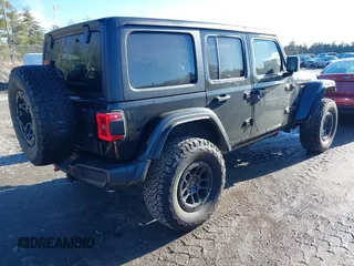 2023 Jeep Wrangler Rubicon with VIN 1C4JJXFGXPW682231, listed as a IAAI auction lot 41110264 with 15,147 mi miles and . Bid and sale history available at DreamBid. Image 4.