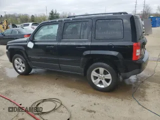 2012 Jeep Patriot Sport with VIN 1C4NJRBB0CD633584, listed as a Copart auction lot 51048195 with 158,847 mi miles and Salvage Title. Bid and sale history available at carsss.com. Image 2.