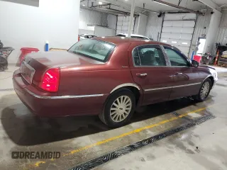 2004 Lincoln Town Car Signature z VIN 1LNHM81W54Y612626, wystawiony jako Copart lot #58399055 z przebiegiem 96 853 mil mil oraz Szkoda całkowita • Salvage title. Historia ofert i sprzedaży dostępna na DreamBid. Obrazek 3.