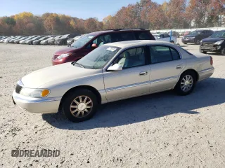 2002 Lincoln Continental with VIN 1LNHM97V62Y699096, listed as a Copart auction lot 77789474 with 106,198 mi miles and Clean Title. Bid and sale history available at carsss.com. Image 1.