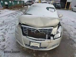 2014 Cadillac XTS Luxury z VIN 2G61M5S37E9304598, wystawiony jako IAAI lot #41006051 z przebiegiem 115 879 mil mil oraz . Historia ofert i sprzedaży dostępna na DreamBid. Obrazek 6.