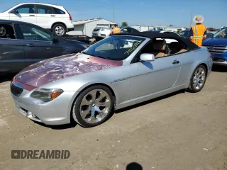 2006 BMW 6 Series 650Ci with VIN WBAEK13456CN78877, listed as a Copart auction lot 74169204 with 114,668 mi miles and Salvage Title. Bid and sale history available at carsss.com. Image 1.