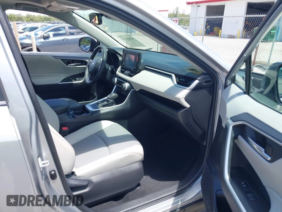 2021 Toyota RAV4 Hybrid LE with VIN 2T3B6RFV2MW018967, listed as a IAAI auction lot 42601989 with 71,046 mi miles and . Bid and sale history available at DreamBid. Image 5.