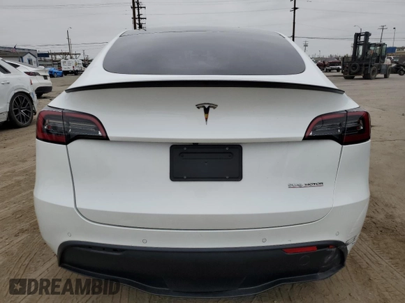 2022 Tesla Model Y Performance with VIN 7SAYGDEF1NF410241, listed as a Copart auction lot 55359505 with 42,652 mi miles and Salvage Title. Bid and sale history available at DreamBid. Image 6.