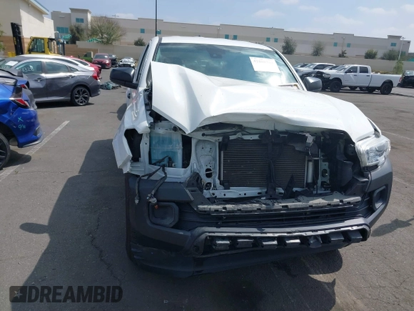 2020 Toyota Tacoma SR with VIN 3TYRX5GN0LT001284, listed as a IAAI auction lot 41888761 with 52,466 mi miles and . Bid and sale history available at DreamBid. Image 6.