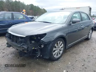 2012 Toyota Avalon with VIN 4T1BK3DB6CU459249, listed as a IAAI auction lot 41802571 with 147,955 mi miles. Bid and sale history available at carsss.com. Image 2.
