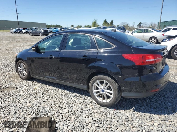 2017 Ford Focus SE with VIN 1FADP3F24HL248615, listed as a Copart auction lot 50526875 with 96,008 mi miles and Salvage Title. Bid and sale history available at DreamBid. Image 2.