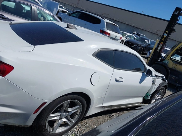 2019 Chevrolet Camaro 1LS with VIN 1G1FB1RX5K0130443, listed as a IAAI auction lot 41586492 with 122,538 mi miles and . Bid and sale history available at carsss.com. Image 14.