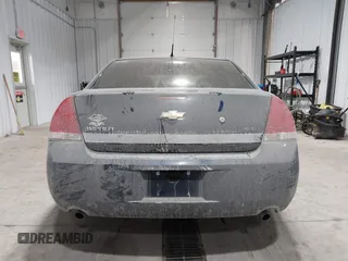 2011 Chevrolet Impala Police Police with VIN 2G1WD5EM2B1165829, listed as a IAAI auction lot 41380558 with 110,695 mi miles. Bid and sale history available at carsss.com. Image 16.