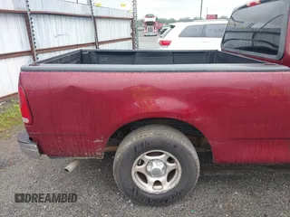 2003 Ford F-150 XL with VIN 1FTRX17W23NA03427, listed as a IAAI auction lot 42335438 with 187,397 mi miles and . Bid and sale history available at DreamBid. Image 21.