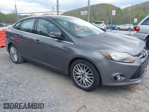 2013 Ford Focus Titanium with VIN 1FADP3J28DL225887, listed as a IAAI auction lot 42122968 with 139,248 mi miles and . Bid and sale history available at carsss.com. Image 1.