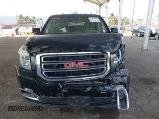 2016 GMC Yukon XL SLE with VIN 1GKS1FKC2GR147222, listed as a IAAI auction lot 41390201 with 86,385 mi miles. Bid and sale history available at carsss.com. Image 12.