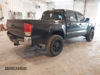 2017 Toyota Tacoma SR5 with VIN 5TFCZ5AN0HX053441, listed as a IAAI auction lot 42376148 with 100,996 mi miles and . Bid and sale history available at DreamBid. Image 4.