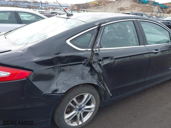 2015 Ford Fusion Titanium Hybrid with VIN 3FA6P0RU6FR299374, listed as a IAAI auction lot 41576007 with 191,285 mi miles. Bid and sale history available at carsss.com. Image 6.