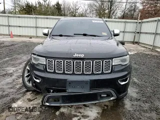 2017 Jeep Grand Cherokee Overland with VIN 1C4RJFCGXHC927470, listed as a Copart auction lot 45132185 with 119,543 mi miles and Salvage Title. Bid and sale history available at carsss.com. Image 11.