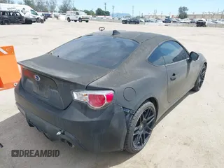 2015 Scion FR-S with VIN JF1ZNAA12F8712371, listed as a IAAI auction lot 42019465 with 21 mi miles. Bid and sale history available at carsss.com. Image 4.