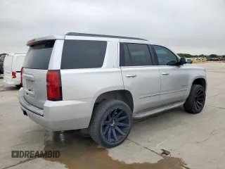 2015 Chevrolet Tahoe LT z VIN 1GNSCBKC5FR606232, wystawiony jako Copart lot #59944965 z przebiegiem 136 413 mil mil oraz Czysty tytuł • Clean title. Historia ofert i sprzedaży dostępna na DreamBid. Obrazek 3.
