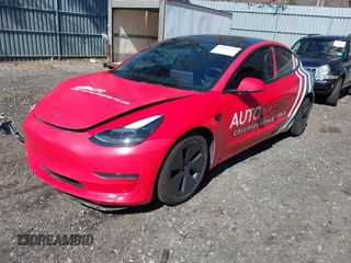 2022 Tesla Model 3 with VIN 5YJ3E1EA5NF168201, listed as a IAAI auction lot 41855273 with 31,393 mi miles and . Bid and sale history available at DreamBid. Image 2.