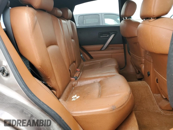 2003 Infiniti FX Options z VIN JNRAS08W03X202372, wystawiony jako Copart lot #46626995 z przebiegiem 124 061 mil mil oraz Szkoda całkowita • Salvage title. Historia ofert i sprzedaży dostępna na DreamBid. Obrazek 11.