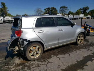 2012 Scion xD with VIN JTKKU4B48C1027734, listed as a Copart auction lot 73393334 with 231,371 mi miles and Salvage Title. Bid and sale history available at DreamBid. Image 3.