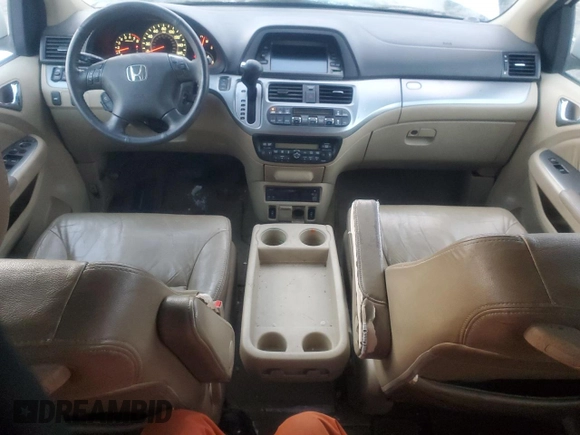 2010 Honda Odyssey EX-L with VIN 5FNRL3H77AB051869, listed as a Copart auction lot 88023625 with 248,511 mi miles and Salvage Title. Bid and sale history available at DreamBid. Image 8.