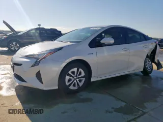 2017 Toyota Prius Two z VIN JTDKARFUXH3038947, wystawiony jako Copart lot #56379015 z przebiegiem 64 230 mil mil oraz Szkoda całkowita • Salvage title. Historia ofert i sprzedaży dostępna na DreamBid. Obrazek 1.