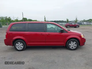2009 Dodge Grand Caravan SE with VIN 2D8HN44E19R533142, listed as a IAAI auction lot 42277333 with 201,081 mi miles and . Bid and sale history available at DreamBid. Image 14.
