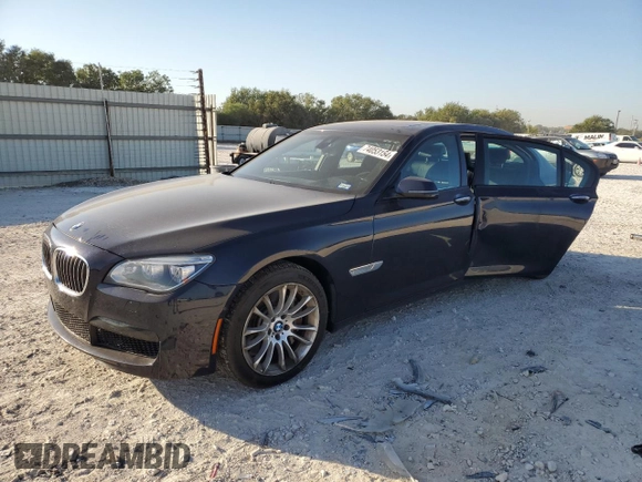2015 BMW 7 Series 750Li with VIN WBAYE8C59FD781318, listed as a Copart auction lot 74053154 with 62,681 mi miles and Salvage Title. Bid and sale history available at carsss.com. Image 1.
